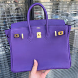 Side view of statement structured handbag