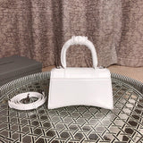 Styled lifestyle shot of chic elevated women's handbag – women's statement bag