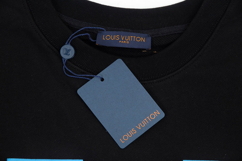 Full styled look of Louis Vuitton luxury clothing with signature branding