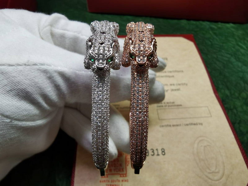 Side view of Cartier unisex jewelry piece
