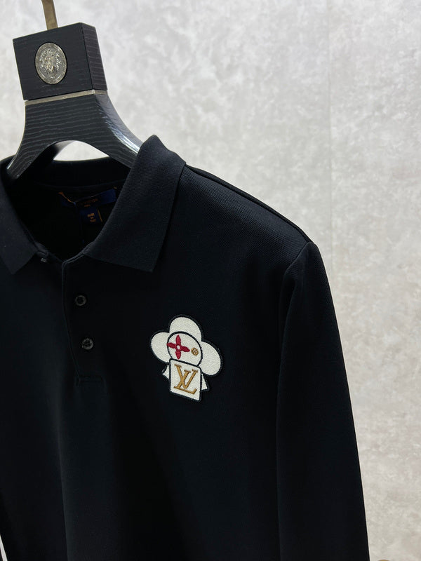 Front view of Louis Vuitton luxury clothing with label-forward styling