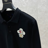 Front view of Louis Vuitton luxury clothing with label-forward styling