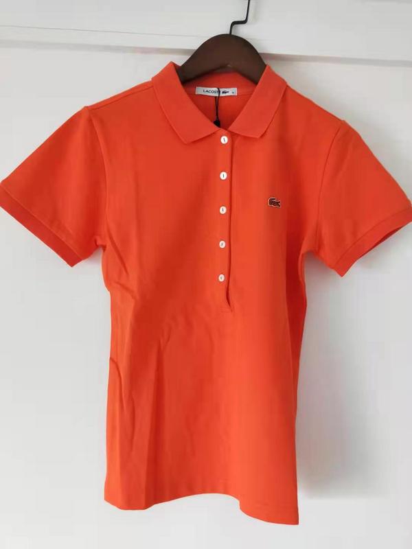 Close-up detail shot of Lacoste luxury clothing with tailored silhouette