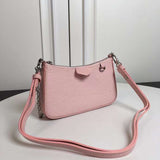 Side profile of statement classic women's handbag – women's everyday handbag