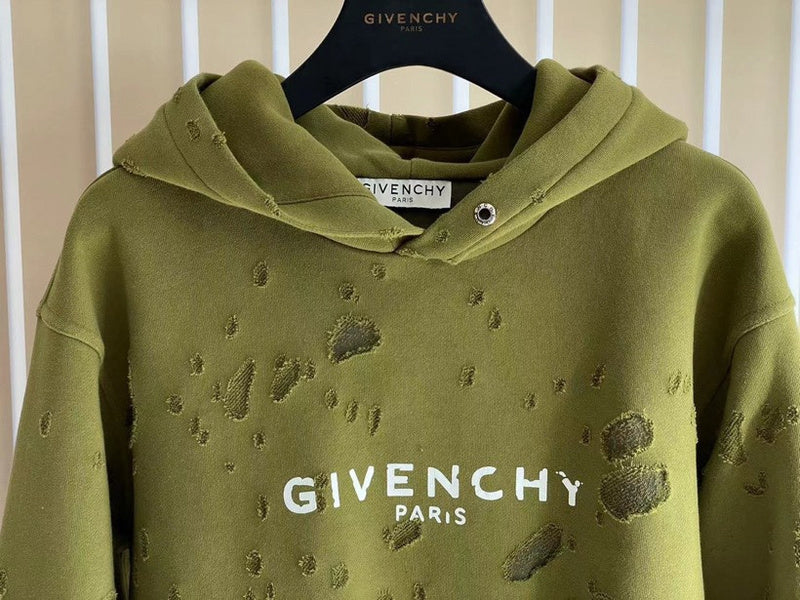 Close-up detail shot of Givenchy luxury clothing with logo-detail design