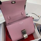 Styled lifestyle shot of structured polished women's handbag – women's luxury handbag
