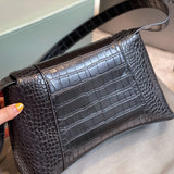 Ziva's Charm handbag – styled view (one versatile size)