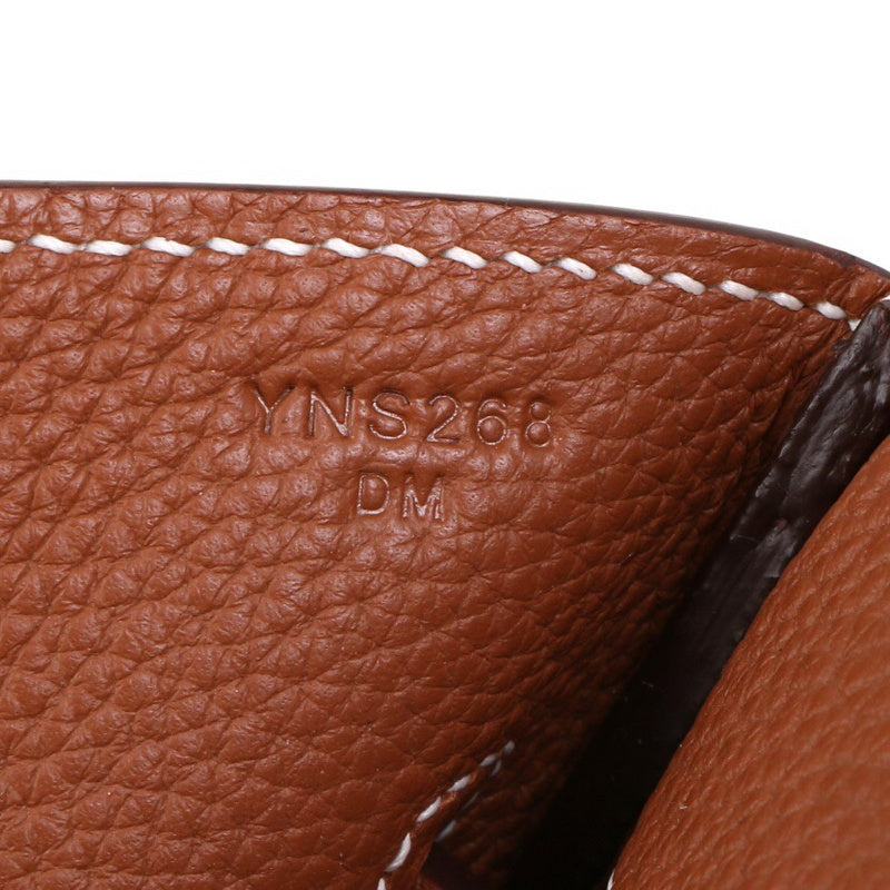 Side view of minimalist structured handbag