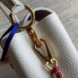  polished top-handle bag detail view showing craftsmanship 8