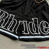 Side profile of Rhude luxury clothing with monogram-inspired silhouette