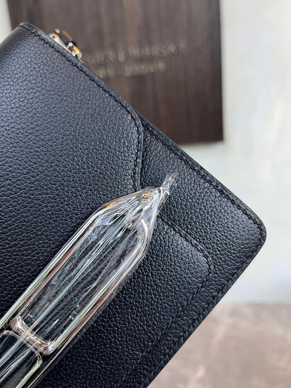 Side view of timeless structured handbag