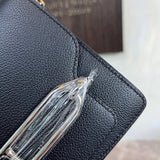 Side view of timeless structured handbag