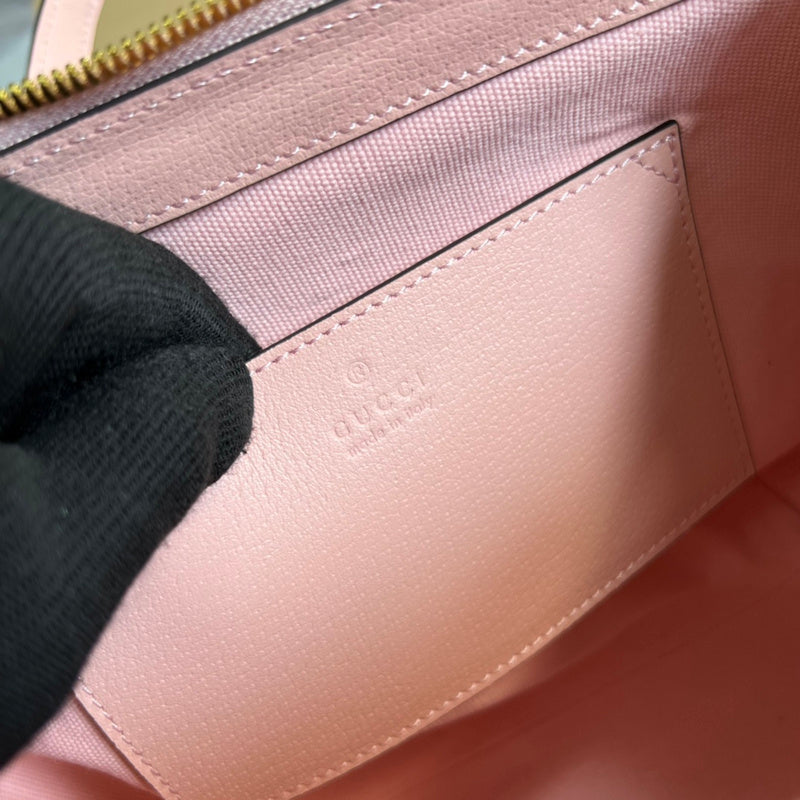 Side profile of premium signature women's handbag – women's designer-style accessory