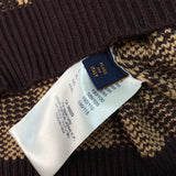 Full styled look of Louis Vuitton luxury clothing with monogram-inspired silhouette