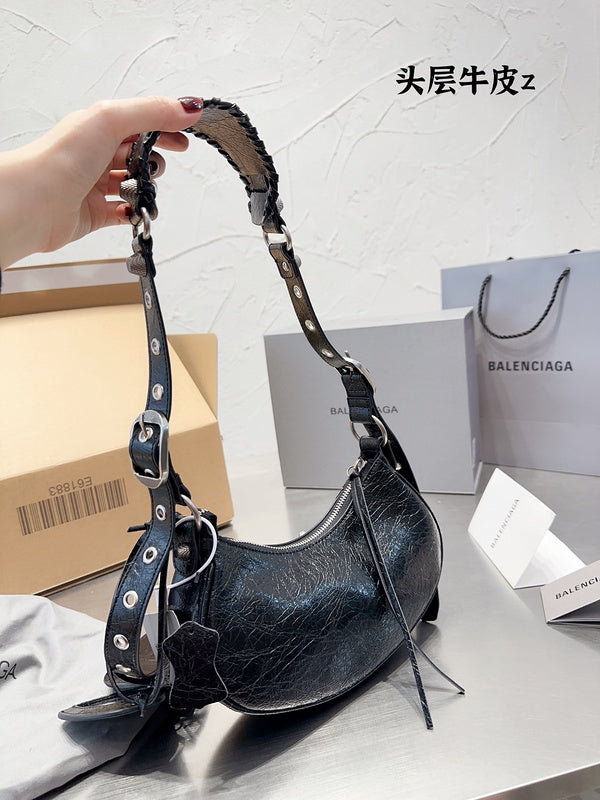 Ziva's Charm handbag – styled view (one versatile size)