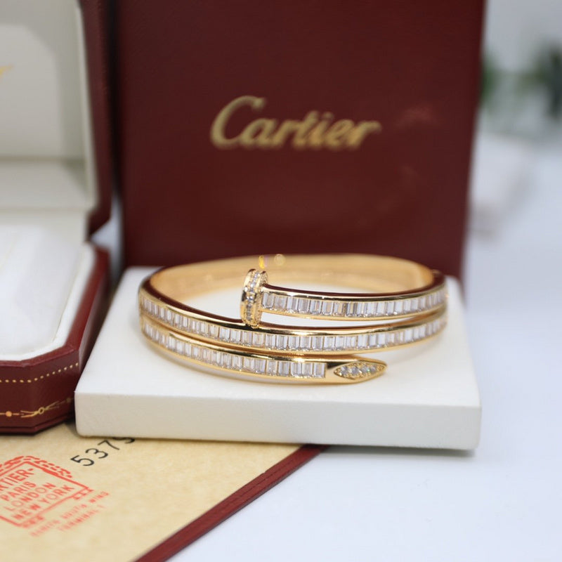 Front view of Cartier unisex jewelry piece