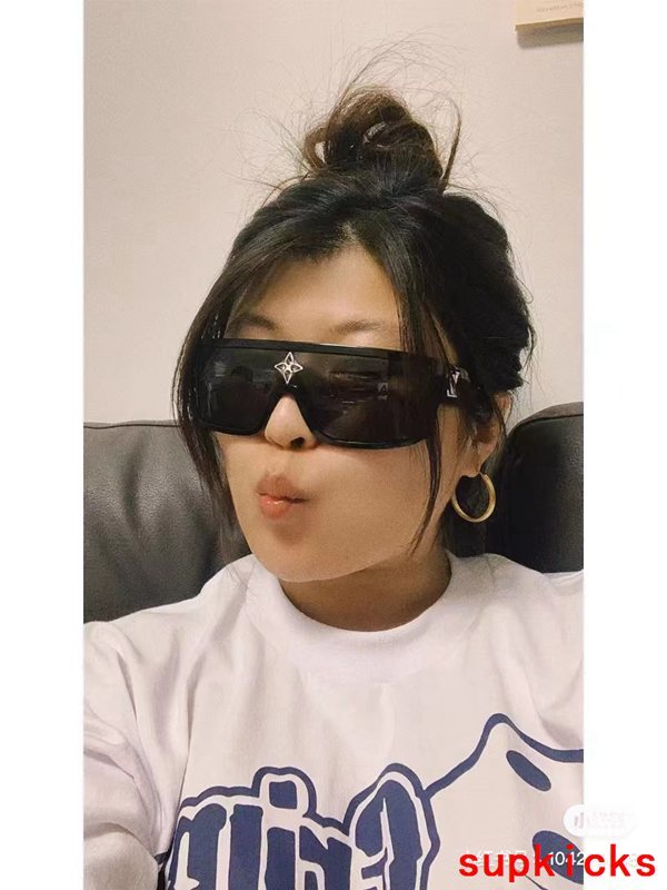 Side view of Louis Vuitton unisex sunglasses