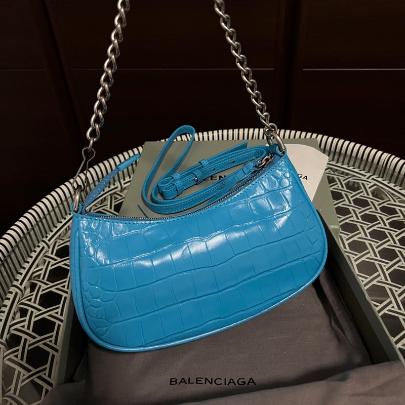 Front view of elevated modern women's handbag – women's luxury accessory