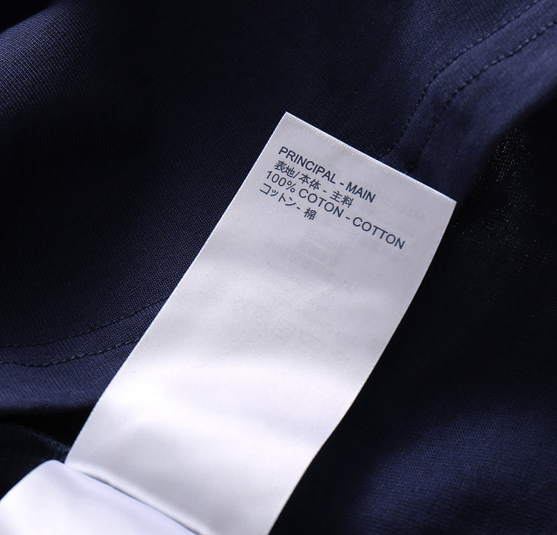 Flat lay presentation of Louis Vuitton cotton t-shirt with monogram-inspired silhouette