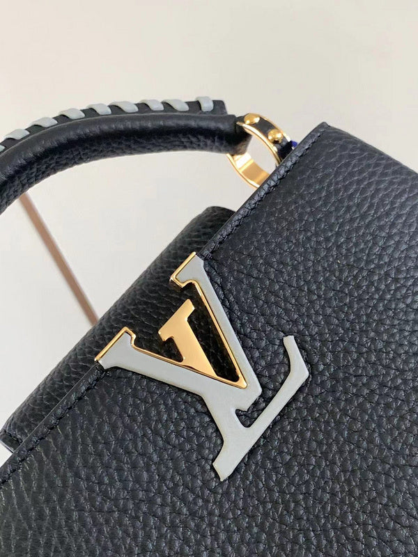 Back view of polished structured women's handbag – women's luxury accessory