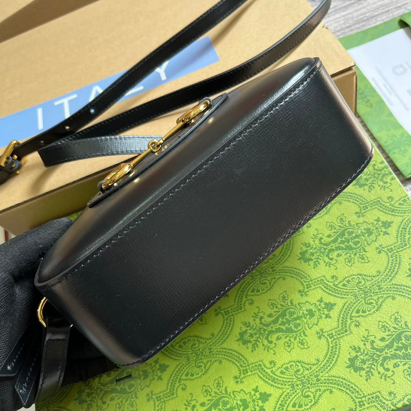 Handle and strap detail of statement structured women's handbag – women's luxury accessory