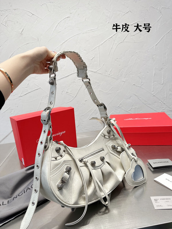 Ziva's Charm handbag – styled view (one versatile size)