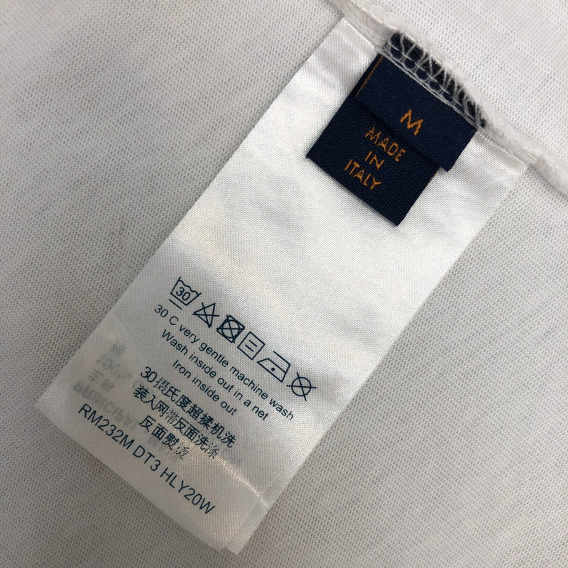 Flat lay presentation of Louis Vuitton cotton t-shirt with monogram-inspired silhouette