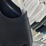 Flat lay presentation of Louis Vuitton luxury clothing with relaxed-fit cut