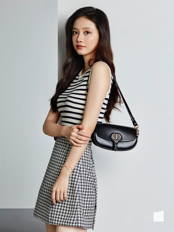 Styled lifestyle shot of refined chic women's handbag – women's designer-style accessory