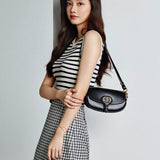 Styled lifestyle shot of refined chic women's handbag – women's designer-style accessory