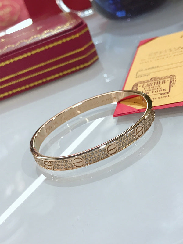 Front view of Cartier unisex jewelry piece