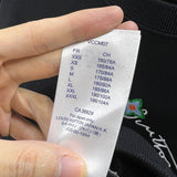 Side profile of Louis Vuitton luxury clothing with logo-detail design