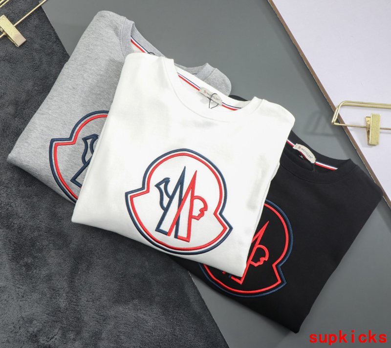 Close-up detail shot of Moncler luxury clothing with everyday silhouette