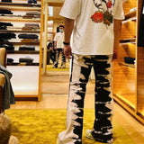 Back view of Louis Vuitton luxury clothing with label-forward styling