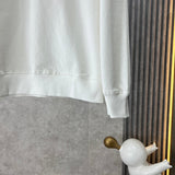 Front view of Louis Vuitton luxury clothing with logo-detail design
