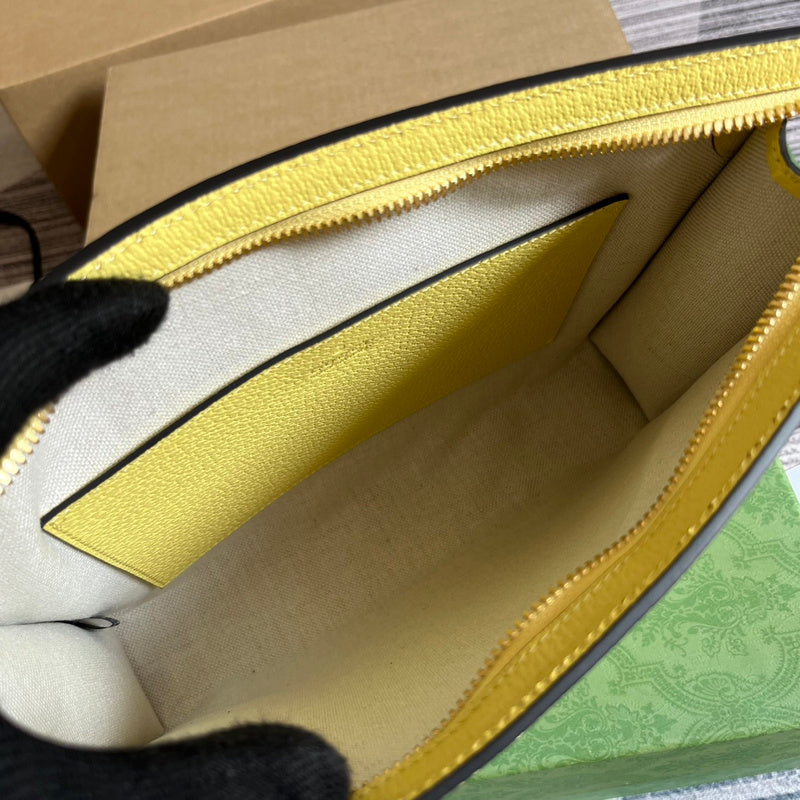 Close-up detail of signature refined women's handbag – women's designer-style accessory