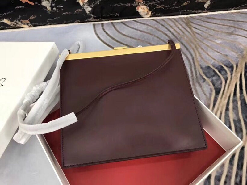 Styled lifestyle shot of modern everyday-luxe women's handbag – women's luxury handbag