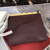 Styled lifestyle shot of modern everyday-luxe women's handbag – women's luxury handbag