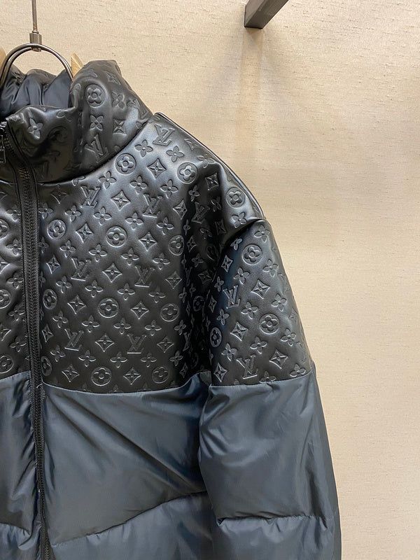 Close-up detail shot of Louis Vuitton luxury clothing with label-forward styling