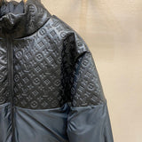 Close-up detail shot of Louis Vuitton luxury clothing with label-forward styling