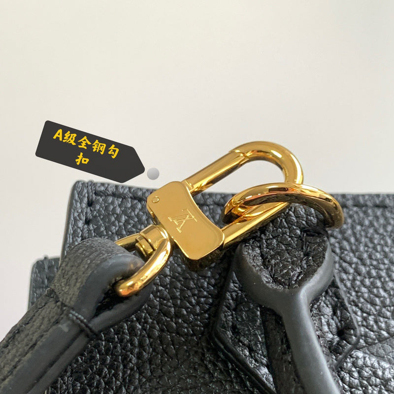 Handle and strap detail of polished sleek women's handbag – women's luxury accessory