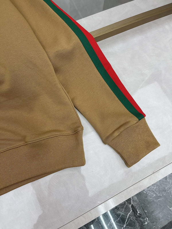 Full styled look of Gucci luxury clothing with monogram-inspired silhouette