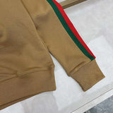Full styled look of Gucci luxury clothing with monogram-inspired silhouette