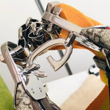 Side profile of elevated signature women's handbag – women's designer-style accessory