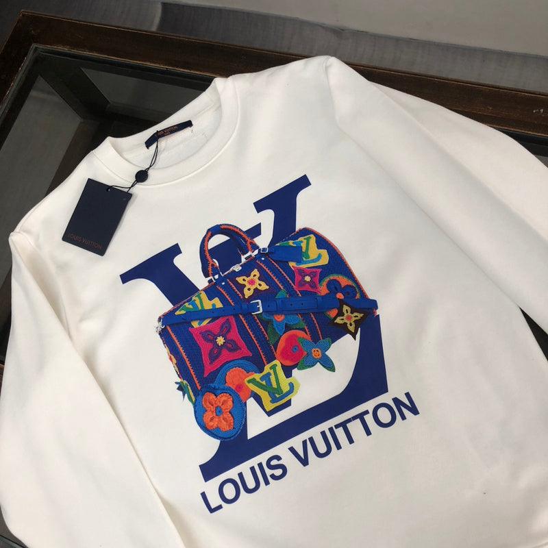 Close-up detail shot of Louis Vuitton luxury clothing with signature branding