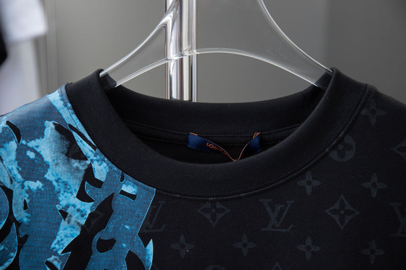 Close-up detail shot of Louis Vuitton cotton t-shirt with logo-detail design