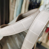 Side view of elegant structured handbag