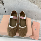 Side profile view of Miu Miu luxury piece style No.105