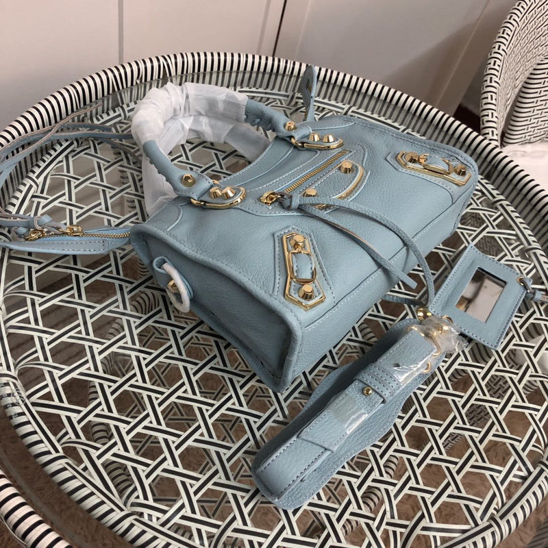 Styled lifestyle shot of structured everyday-luxe women's handbag – women's designer-style accessory