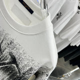 Full styled look of Louis Vuitton luxury clothing with relaxed-fit cut